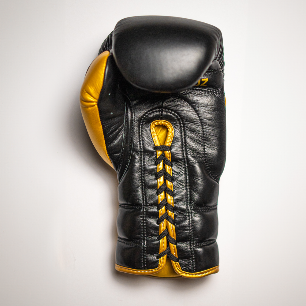 Boxing gloves with laces.
