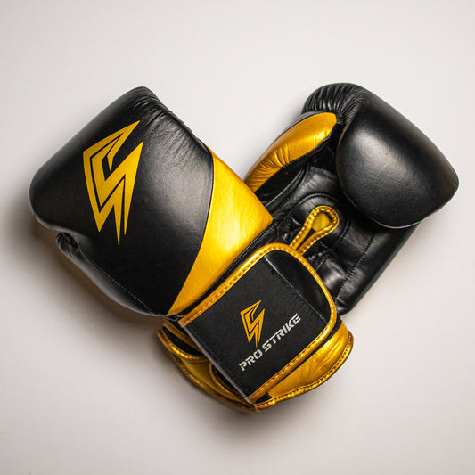 Boxing gloves with velcro strap.