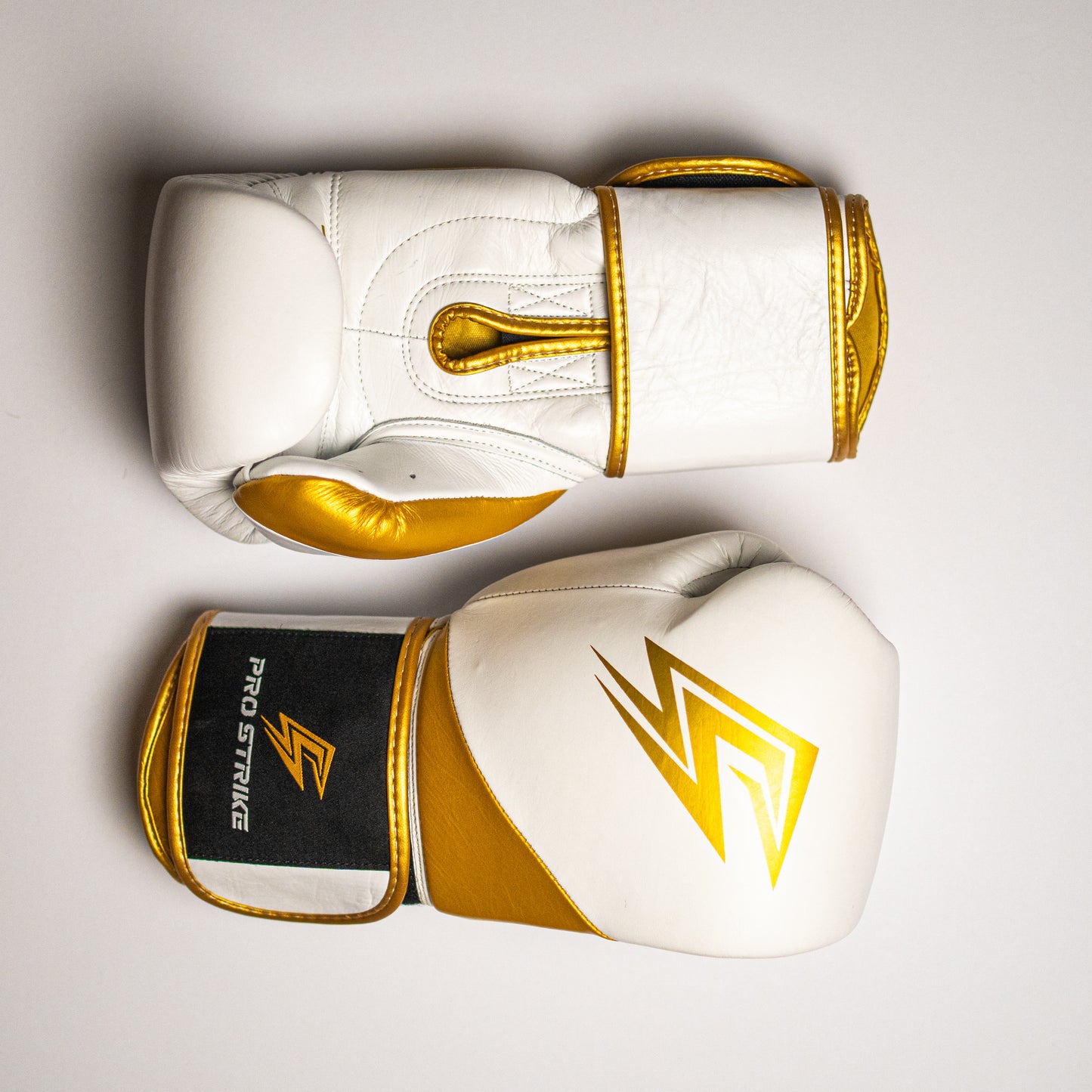 Boxing gloves with velcro strap.