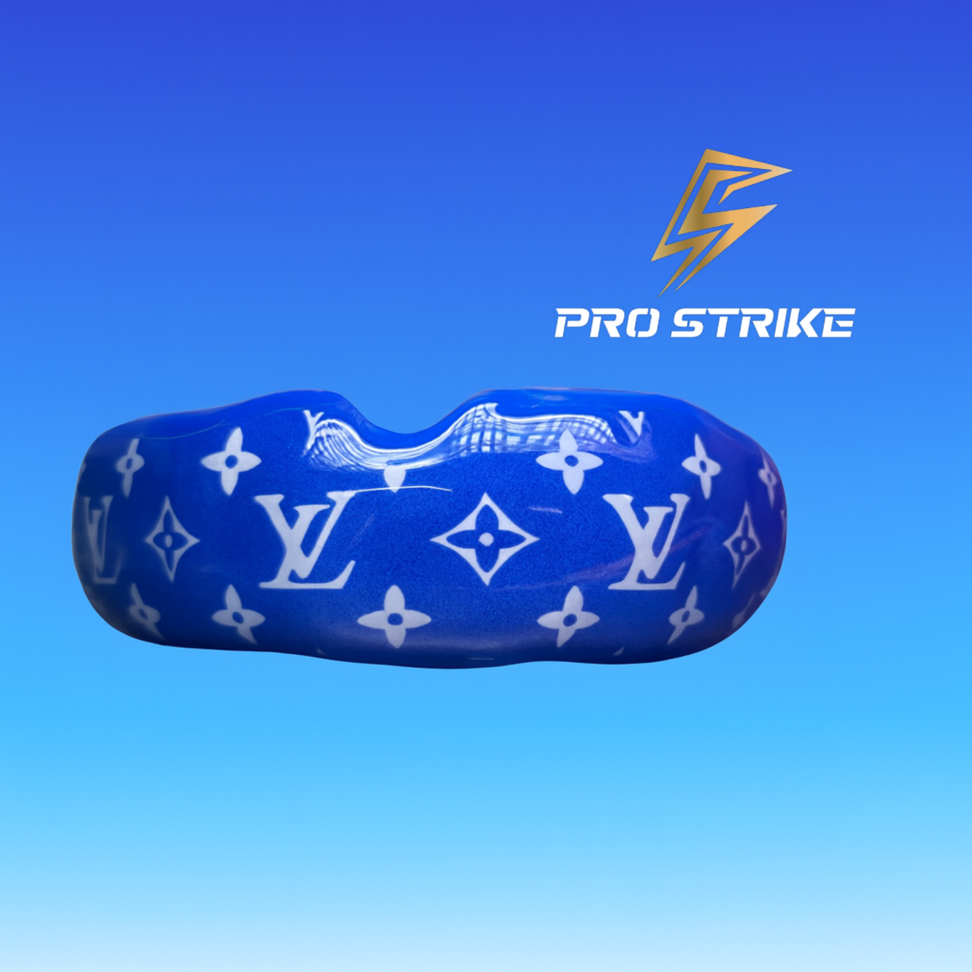 Blue mouthguard with white patterns on a blue background, featuring 'Pro Strike' logo.